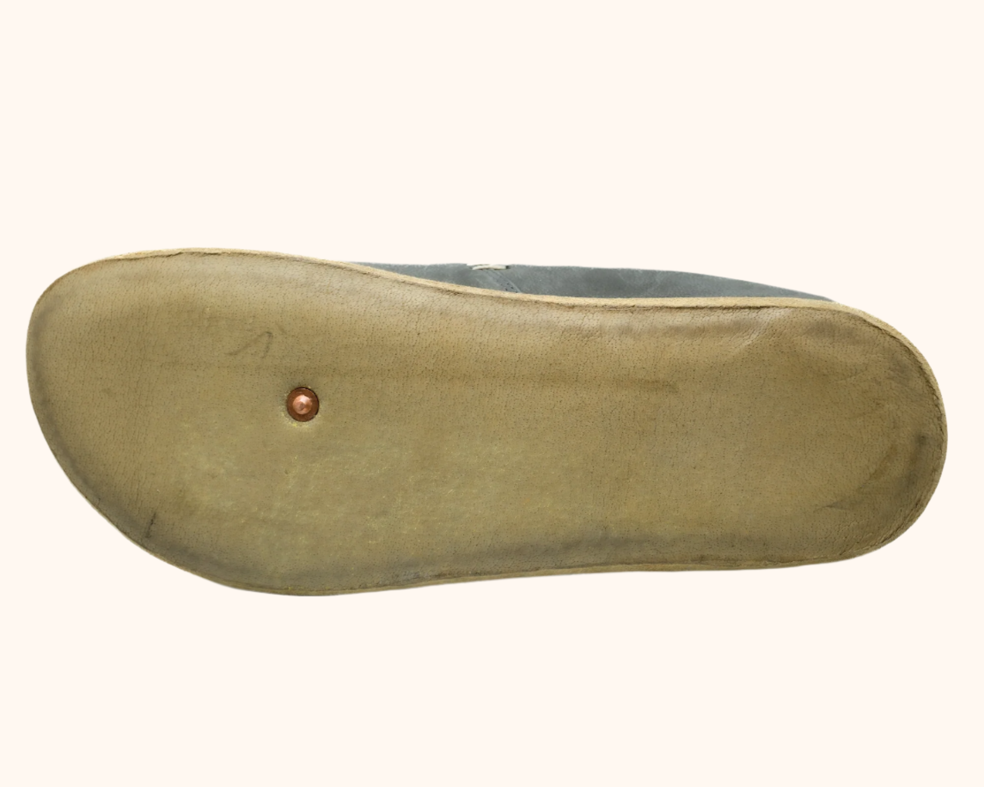 RHIZAL Brio Grounding Earthing Slip-On in Stone Grey Leather. Pure copper earthing rivet plug through water buffalo sole.